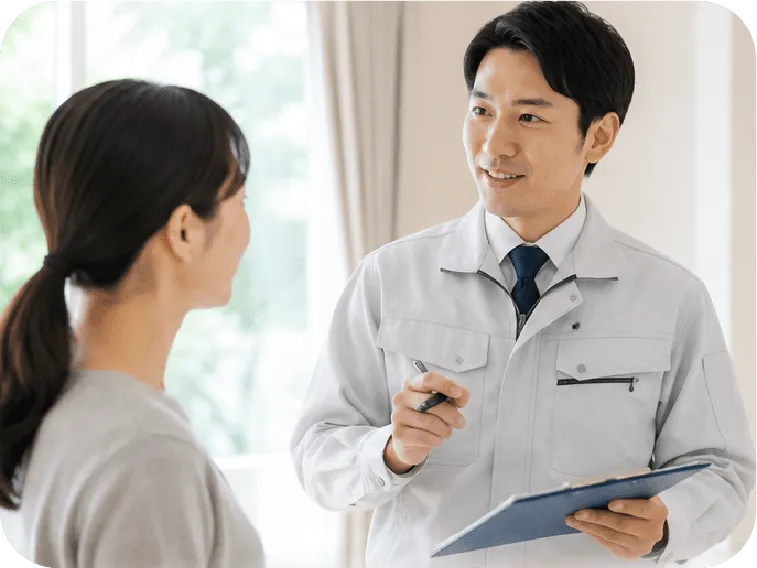お客様に施工内容を説明する担当者
